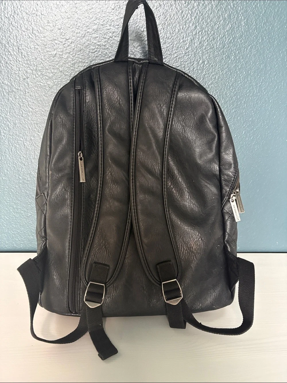 The Honest Company Diamond Quilted Black Faux Leather Backpack